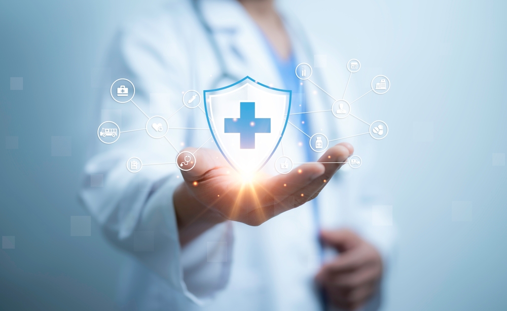 A,medical,worker,holding,of,health,care,icons,,medical,technology