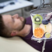 Man,in,in,hospital,getting,iv,infusion,of,fruit,slices